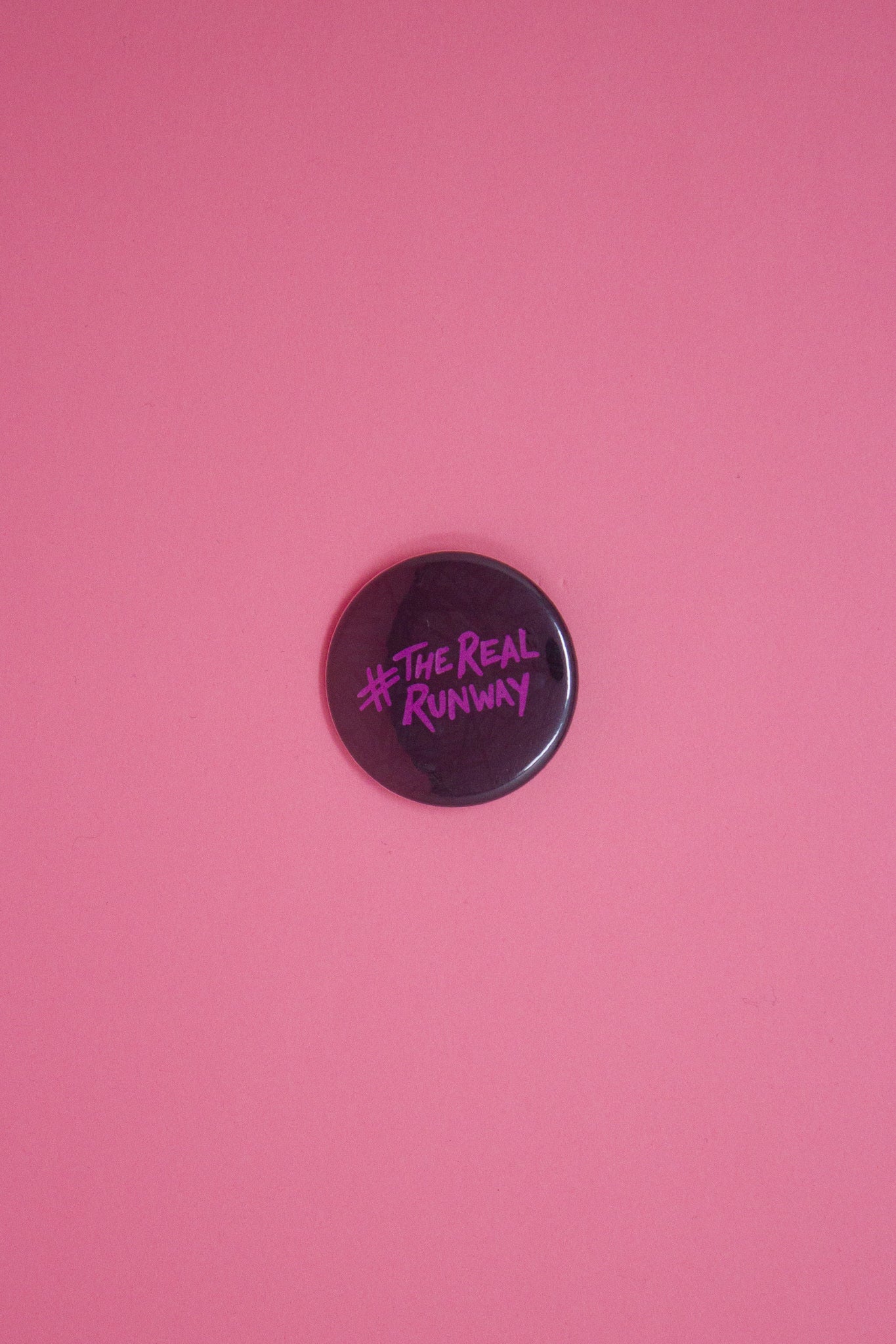 #therealrunway Button